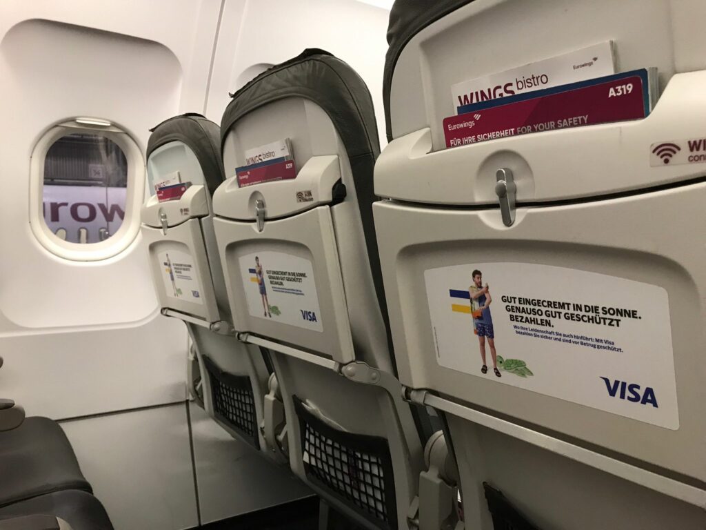 Tray table branding VISA on a Eurowings Airbus A319