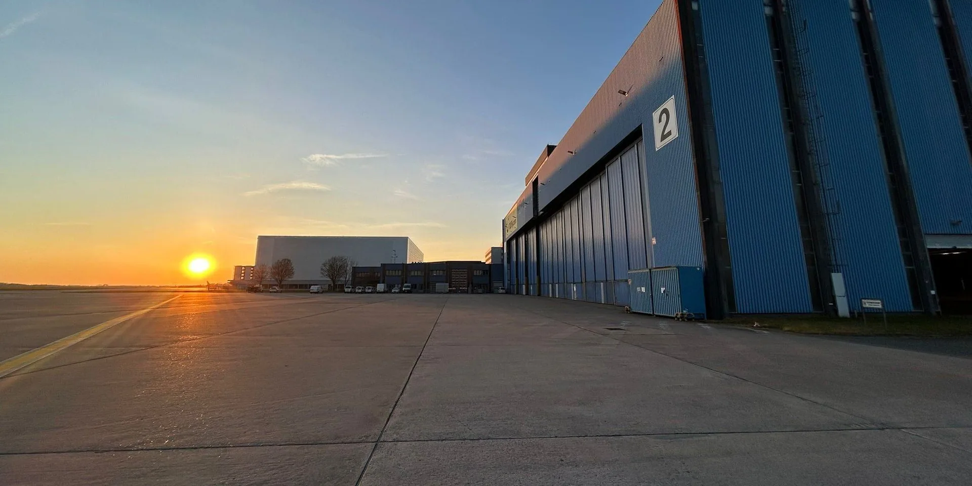 Hangar 2 at Hannover Airport from the apron at sunrise
